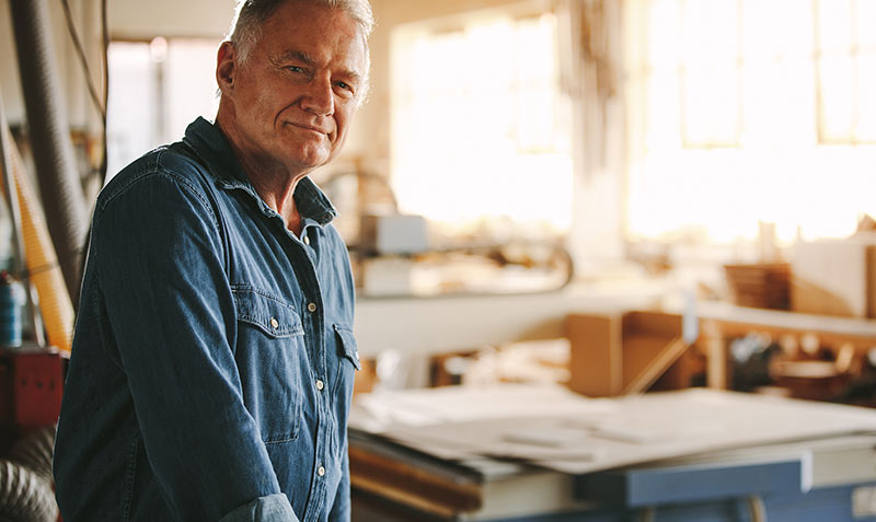 Older gentleman looking stoicly at camera